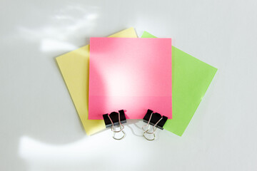 Colored sheets of paper on a white background