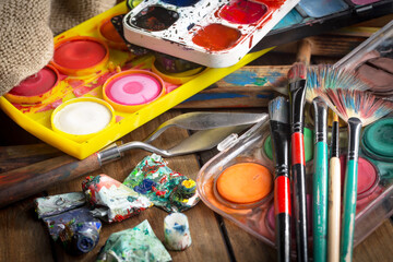 Paints and brushes for drawing. Artistic creativity.