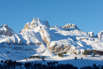 Snow-capped peak in the Pyrenees - obrazy, fototapety, plakaty