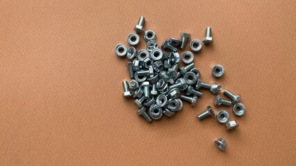 Bolts and nuts top view. Fasteners.