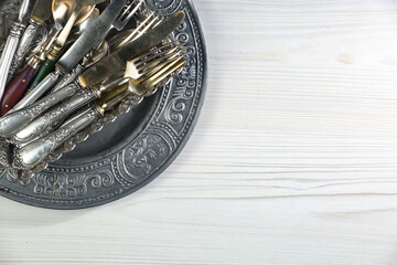 Silverware on an old background.