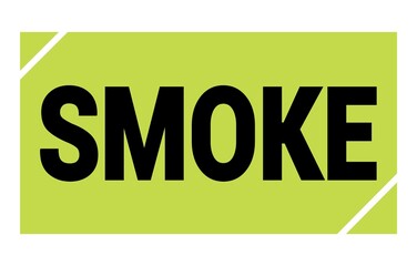 SMOKE text written on green-black stamp sign.