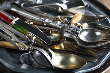 Silverware on an old background.