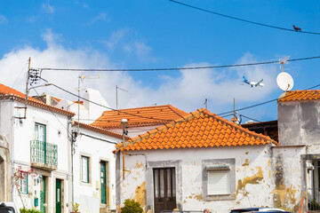 Red roofs , old houses and blue sky 