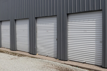 Obraz na płótnie Canvas Self storage and mini storage garage units. Personal warehouse lockers provide safe and secure storage options.