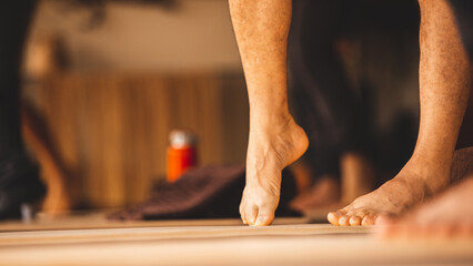 foot in a dace yoga movement