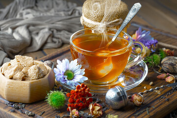 Sweet, hot tea with dessert, on an old background.