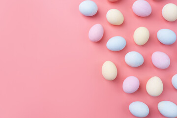pastel colored easter eggs pattern on pink background