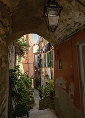 Fototapeta na wymiar Traditional Italian architecture, colorful houses and narrow street in VERNAZZA, Italian Riviera, Cinque Terre, Liguria, Italy