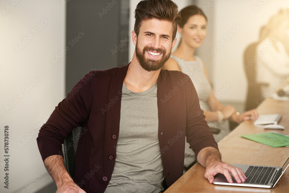 Poster it always seems impossible until its done. portrait of a young designer sitting in an office with hi