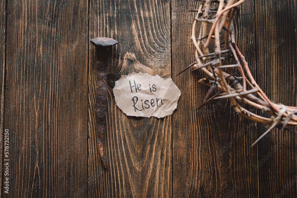 Wall mural He is Risen. Jesus Crown Thorns and nails and cross on a wood background. Crucifixion Of Jesus Christ. Passion Of Jesus Christ. Concept for faith, spirituality and religion. Easter Day