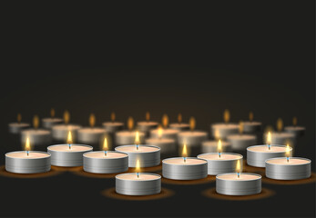 Lots of candles in metal cases. Composition of burning candles on dark background.