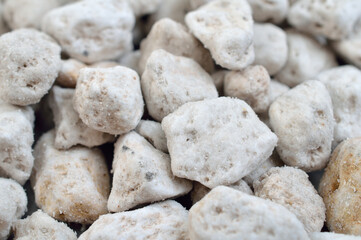 Porous white volcanic rock. Lava stone, pumice stone, or volcanic pumice with distinctive pores