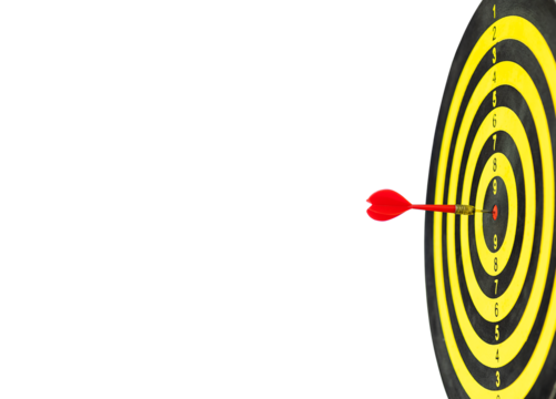 Red dart arrow hitting in bullseye on dartboard