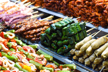 Many snacks and seafood in vietnamese night market in Da Lat