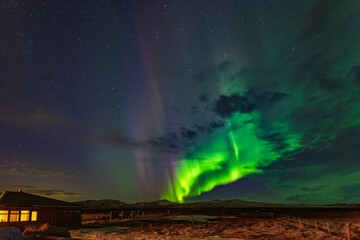 Fototapeta na wymiar Northern lights in the night sky in Iceland.