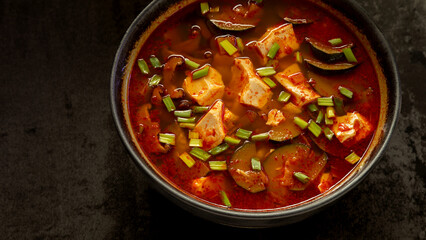 Sundubu jjigae: Korean spicy soft tofu stew with zucchini, scallions, shiitake, silken tofu.