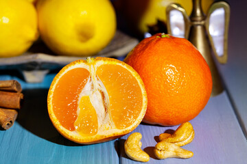 sliced tangerine on wood background