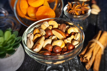 nut mix  in a bowl on wood background