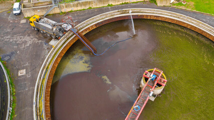 Aerial view of the tanks of a sewage and water treatment plant enabling the discharge and re-use of...