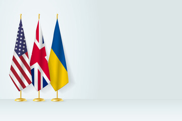 Flags of United States, United Kingdom and Ukraine stand in row on indoor flagpole.