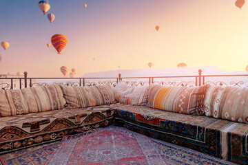 Obraz premium Landscape sunrise in Cappadocia with set colorful hot air balloon fly in sky with sun light. Concept tourist travel Goreme Turkey