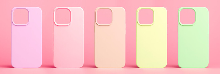 set of five back covers for mobile phone in different colors isolated on pink background, phone...