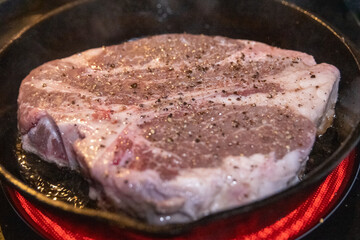 Porterhouse Steak searing