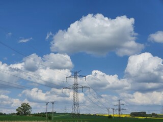 High voltage power lines in the natural rural landscape