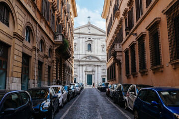 View at the Santa Maria in Vallicella from the narrow street in Rome, Italy