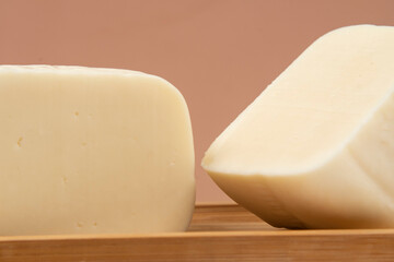 Minas half-cured cheese on a bamboo tray,