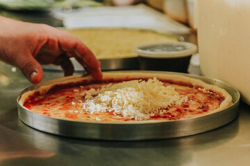 Fazendo pizza