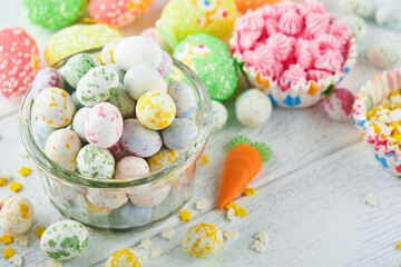 Sweet Easter concept. Sweet Easter kids holiday assortment marshmallows rabbit, chocolates easter...