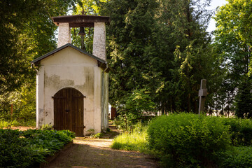 white chapel, Latvia cemetery, burial ground - obrazy, fototapety, plakaty