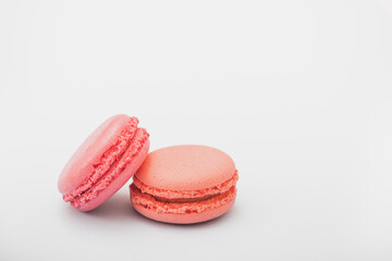 Macaroons, baked sweets from the pastry shop on white background