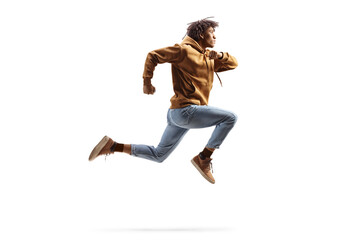 Full length profile shot of a young african american guy jumping - Powered by Adobe
