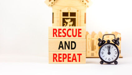 Rescue and repeat symbol. Concept words Rescue and repeat on wooden block on a beautiful white...
