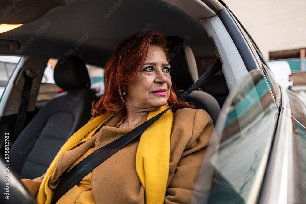 Wall mural mature woman driving car angry