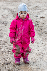 The little girl fell into the dirt