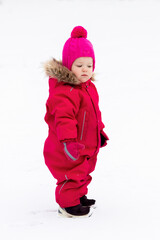 A little girl in the harsh northern winter