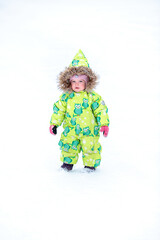 A little girl in the harsh northern winter