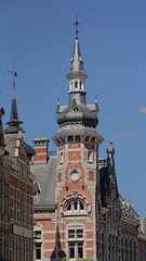 Fototapeta na wymiar Ornate tower, detail of a house in Flemish renaissance architecture in Louvain, Flanders, Belgium 