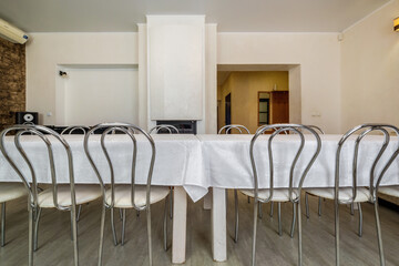 large table with chairs in the banquet hall