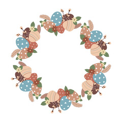 Easter flower wreath . Easter frame with decorated eggs and flowers and symbols of bright Easter