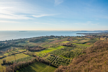 Fototapeta na wymiar Aerial view of the Lake Garda with Sirmione and Desenzano in bachground