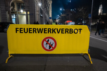 Zurich, Switzerland - January 1, 2023: A yellow billboard with german sign indicates on New Year...