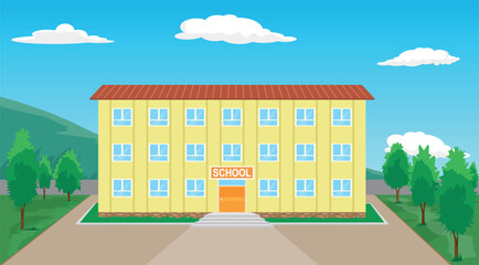 yellow colored and 3-storey school building in the garden