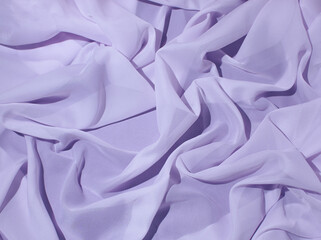 Smooth elegant lilac silk or satin texture can use as wedding background. Luxurious background design