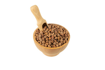 brown chickpeas in wooden bowl and scoop isolated on white background. nutrition. food ingredient.