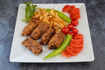 Turkish style meatballs. Turkish cuisine delicacies. Meatballs fried in breadcrumbs. local name Kadin Budu Kofte or Women's Leg Meatballs. 